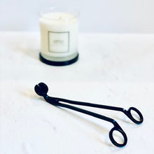 Load image into Gallery viewer, wick trimmer in front of emo candle